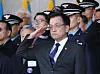 Acting President Choi Sang-mok salutes the Korea Air Force Academy during a graduation ceremony at the academy's campus in Cheongju, North Chungcheong, on March 12. [YONHAP]