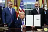 U.S. President Donald J. Trump (center) delivers remarks with U.S. Senator Ted Cruz (left) and U.S. Secretary of Commerce Howard Lutnick (right) during a signing ceremony on AI in the Oval Office of the White House in Washington, DC, on Dec. 11. [EPA/YONHAP]