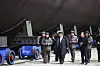 North Korean leader Kim Jong-un, center, visits a shipbuilding site where his country claims to be building a nuclear submarine on March 8. [RODONG SINMUN]