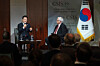 Korean President Lee Jae Myung, left, speaks at the Center for Strategic and International Studies (CSIS) in Washington on Aug. 25, as CSIS President and CEO John Hamre listens. [AP/YONHAP]