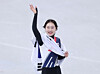 Short track speed skater Choi Min-jeong greets the crowd draped in the Korean flag after securing the silver medal in the women’s 1,500-meter final at the 2026 Milan-Cortina Winter Olympics at the Milano Ice Skating Arena, Italy, on Feb. 20 (local time). [NEWS1]