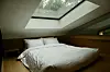 A queen-sized bed in the loft inside a treehouse at wellness village Surakhyu in Nowon District in northern Seoul on June 28 [LEE SOO-JUNG]