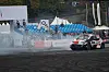 Toyota Motor Group Chairman Akio Toyoda drifts with Hyundai Motor Group Executive Chair Euisun Chung in the passenger seat at the Hyundai N x Toyota Gazoo Racing Festival event, held Sunday in Everland Speedway in Yongin, Gyeonggi. [CHO YONG-JUN]