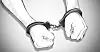 An illustration of a person's arms in handcuffs [YONHAP]