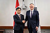 South Korean Defense Minister Ahn Gyu-back and his Canadian counterpart, David McGuinty, shake hands during their meeting in Ottawa on Feb. 25. [MINISTRY OF NATIONAL DEFENSE]