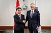 Korean Defense Minister Ahn Gyu-back, left, and his Canadian counterpart, David McGuinty, shake hands during their meeting in Ottawa on Feb. 25. [MINISTRY OF NATIONAL DEFENSE]