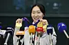 Short track speed skater Choi Min-jeong poses for photos with her gold medals at Incheon International Airport on Feb. 10, 2025, after returning from the Harbin Winter Asian Games. [YONHAP]