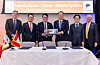 Officials pose for a photo during a signing ceremony for multiple partnerships among Hanwha Group affiliates and Canadian firms in Toronto, Canada, on Jan. 26. [HANWHA GROUP]