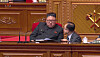 Workers' Party of Korea Organizational Secretary Jo Yong-won, bottom right, bends down and talks to North Korean leader Kim Jong-un during the 8th Party Congress on Jan. 9, 2021. [YONHAP]