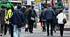 Office workers head to work across Gwanghwamun Square in Jongno District, central Seoul, on April 14. [NEWS1]