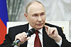 Russian President Vladimir Putin speaks at the Kremlin in Moscow, Russia, on June 12 with participants of the Time of Heroes, an educational program for veterans of the conflict in Ukraine. [AP/YONHAP]