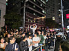 People crowd the street in front of a chicken shop in Gangnam District, southern Seoul, where Nvidia CEO Jensen Huang, Hyundai Motor Group Executive Chair Euisun Chung and Samsung Electronics Executive Chairman Lee Jae-yong are set to meet on Thursday [YONHAP]