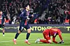 Paris Saint-Germain midfielder Lee Kang-in, left, celebrates scoring during a Ligue 1 match against Strasbourg in Paris on Saturday. [EPA/YONHAP]
