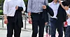 Office workers walk across a street near Namdaemun on May 29, 2024. [YONHAP]