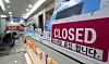 A notice informing patients of the clinic's closure on Tuesday is placed on a desk in a private clinic in Gyeonggi on Monday. [NEWS1]