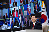 President Yoon Suk Yeol presides over a virtual leaders’ plenary session during the 3rd Summit for Democracy, hosted by Korea, at the Blue House in central Seoul on Wednesday evening. [PRESIDENTIAL OFFICE]