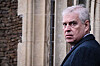 Britain's Prince Andrew, Duke of York reacts as he arrives for the Royal Family's traditional Christmas Day service at St. Mary Magdalene Church in Sandringham, Norfolk, eastern England, on Dec. 25, 2022. King Charles III will strip his younger brother Andrew of his royal titles and oust him from his long-term residence on the Windsor estate, the palace said on Oct, 30, the latest fallout to hit the scandal-plagued royal over the Jeffrey Epstein affair. [AFP/YONHAP]