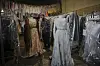 A tailor works on a stage costume for Giacomo Puccini's 'Tosca' in the costume warehouse of the Teatro dell’Opera in Rome, April 10. [AP/YONHAP]