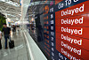 Screens at Incheon International Airport display flight delays. [NEWS1]