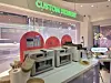 An oven-style air fryer and a whipped cream dispenser are displayed at the CU Seongsu Dessert Park branch in the Seongsu-dong neighborhood of Seongdong District, eastern Seoul, on Feb. 12. [NOH YU-RIM]