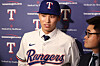 Kim Seong-Jun of the Texas Rangers talks to the media after signing with the team at Globe Life Field in Arlington, Texas on May 18. [REUTERS/YONHAP]