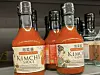 A bottle of Kimchi Sauce featuring a woman wearing a Japanese kimono and the Chinese term for pickled vegetables is displayed in a supermarket in Europe in this photo provided by Seo Kyoung-duk, a professor at Sungshing Women's University. [SCREEN CAPTURE]