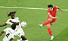 Lee Kang-in, right, shoots during the World Cup group H football match between Korea and Ghana at the Education City Stadium in Al Rayyan, Qatar on Nov. 28, 2022. [YONHAP]