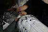 Members of the Families of Abductees to North Korea Association prepare to launch balloons carrying leaflets toward North Korea behind the fence at Peace Land in Paju, Gyeonggi, on April 27. [FAMILIES OF ABDUCTEES TO NORTH KOREA ASSOCIATION]