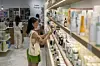 A customer checks out Korean beauty products at a Senti Senti store in New York on July 25, 2025. [AP/YONHAP]