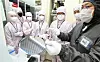 Students receive training in semiconductor manufacturing at the Inter-University Semiconductor Research Center at Seoul National University in Gwanak District, southern Seoul. [YONHAP]