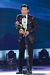 Actor Hwang Jung-min wins the Best Male Actor Award for the Film category for his role in film “12.12: The Day” (2023) at the 60th Baeksang Arts Awards on Tuesday evening in southern Seoul. Hwang played a fictional version of Chun Doo Hwan, a former president who came to power through the military coup of 1979. [BAEKSANG ARTS AWARDS ORGANIZING COMMITTEE]
