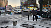 A commuter is seen grabbing onto a pole for balance near Seoul National University Station in Gwanak District, southern Seoul, on Dec. 5. [LEE GYU-RIM]