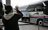 A woman waves to a passenger in a bus preparing to leave Seoul Express Bus Terminal in Seocho District, southern Seoul, on Jan. 7, 2024. [NEWS1]