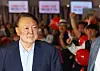Former President Yoon Suk Yeol heads into a screening room at Megabox Dongdaemun in Seoul on May 21 to watch the documentary film ″Election Fraud: A Work of God?″ [YONHAP]
