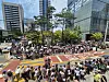 Fans stand outside HYBE headquarters in Yongsan, central Seoul, on June 12 to welcome BTS member Jin on the day he finished his military duty. [HYBE]