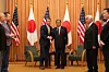 US Secretary of Defense Pete Hegseth (centre, L) shakes hands with Japan's Prime Minister Shigeru Ishiba during their meeting at the Prime Minister's office in Tokyo on March 30, 2025. The United States will ensure ″robust, ready and credible deterrence″ across the Taiwan Strait, US Defense Secretary Pete Hegseth said on March 30, calling China ″aggressive and coercive″.[AFP/YONHAP]