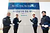 HD Hyundai and HD Construction Equipment executives including Chung Ki-sun, second from left, chairman of HD Hyundai, and Moon Jae-young, third from left, CEO of HD Construction Equipment, pose for a photo during a ceremony to unveil a plaque at the company's Ulsan Campus on Jan. 1. [HD HYUNDAI]