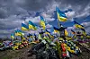 National flags wave at the 'Alley of Heroes' during the Orthodox Christian holiday of 'Provody,' at a cemetery in Kramatorsk, Donetsk region, eastern Ukraine, on 27 amid the Russian invasion. In Ukraine, 'Provody,' the 'Day of Rejoicing,' is a memorial for deceased relatives observed the week after Easter. Traditionally, flowers, food, and personal items are brought to graves to remember loved ones. [EPA/YONHAP]