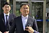 Kim Man-bae, a major shareholder of private asset management firm Hwacheon Daeyu, speaks to reporters outside Suwon High Court in Suwon, Gyeonggi, on April 8. [SON SUNG-BAE]