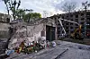 Flowers and toys are placed at the site of a destroyed house after a Thursday Russian strike on a residential neighborhood in Kyiv, Ukraine, on April 25. [AP/YONHAP]