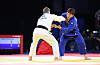 Korean judoka Lee Joon-hwan, right, competes in the men’s -81 kilogram bronze medal match at the Paris Olympics against Matthias Casse of Belgium at the Champ-de-Mars Arena in Paris on Tuesday. [JOINT PRESS CORPS]