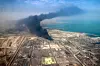 This handout picture provided by the media office of the Iranian presidency shows heavy smoke billowing at the site of an explosion that took place a day earlier at the Shahid Rajaee port dock southwest of Bandar Abbas in the Iranian province of Hormozgan on April 27. [AFP/YONHAP]