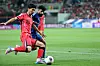 Korea's Jeon Jin-woo, left, dribbles during a 2026 World Cup qualifier against Kuwait at Seoul World Cup Stadium in western Seoul on June 10. [NEWS1]