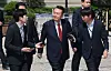 Former President Yoon Suk Yeol looks at his supporters as he appears at the Seoul Central District Court in southern Seoul on May 26, 2025, to attend the fifth hearing of a trial over insurrection charges in connection with his declaration of martial law. [YONHAP]
