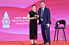 Korean badminton player An Se-young, left, poses for a photo with Badminton World Federation (BWF) President Poul-Erik Hoyer at the annual awards ceremony during the BWF World Tour welcome banquet in Hangzhou, China on Monday. [XINHUA/YONHAP]