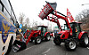 Tractors driven by a farmers' group calling for President Yoon Suk Yeol's arrest are stopped by police in southern Seoul on Dec. 21. [NEWS1]