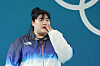 Korean weightlifter Park Hye-jeong reacts after winning a silver medal in the women's +81 kilogram final at the Paris Olympics at South Paris Arena 6 in Paris on Sunday. [YONHAP]