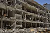 A damaged building after a missile strike launched from Iran in Tel Aviv, Israel, on Sunday, June 22, 2025. [AP/YONHAP]