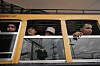 Guatemalan migrants deported from the United States look out from a bus after arriving in Guatemala City, on Aug. 31. [AP/YONHAP]