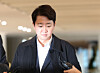 Lee Jun-seok, leader of the minor conservative Reform Party, appears before the Min Joong-ki special counsel team in downtown Seoul on Dec. 21. [YONHAP]